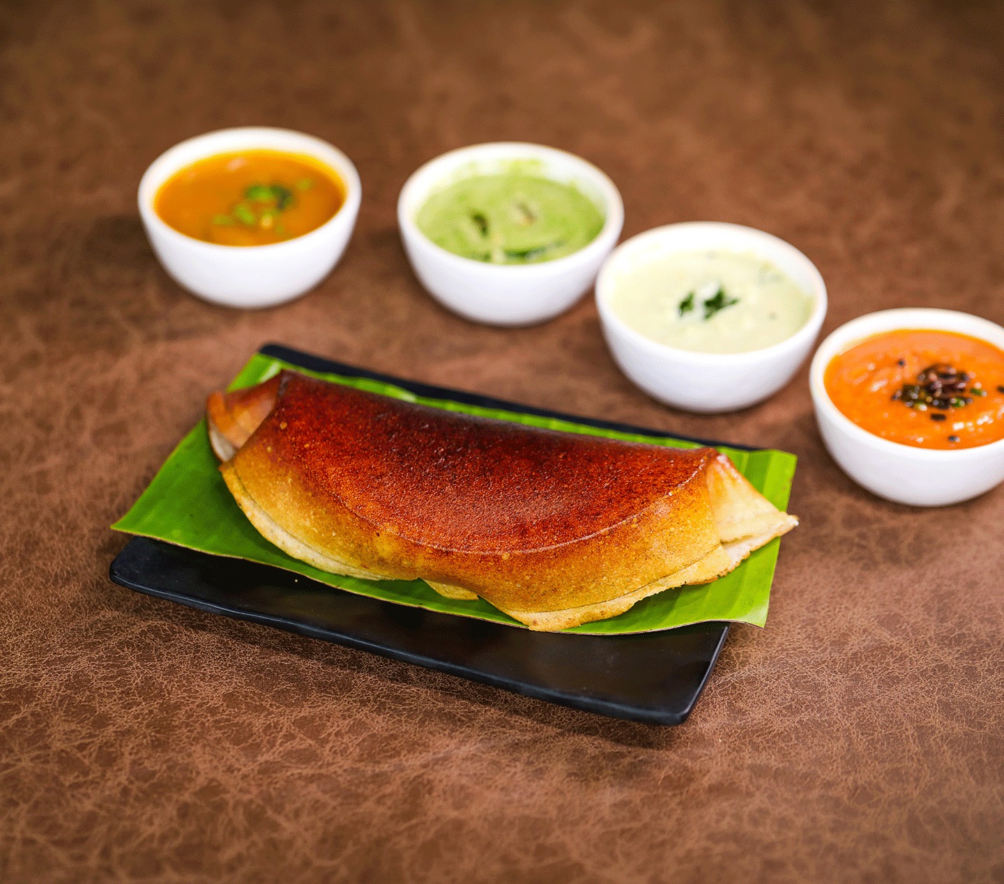 Crispy Mysore masala dosa served with sambar and chutneys